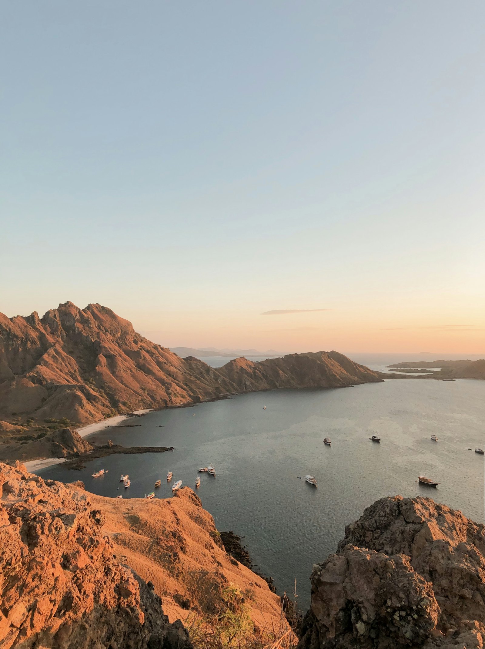 Golden hills above a sheltered anchorage